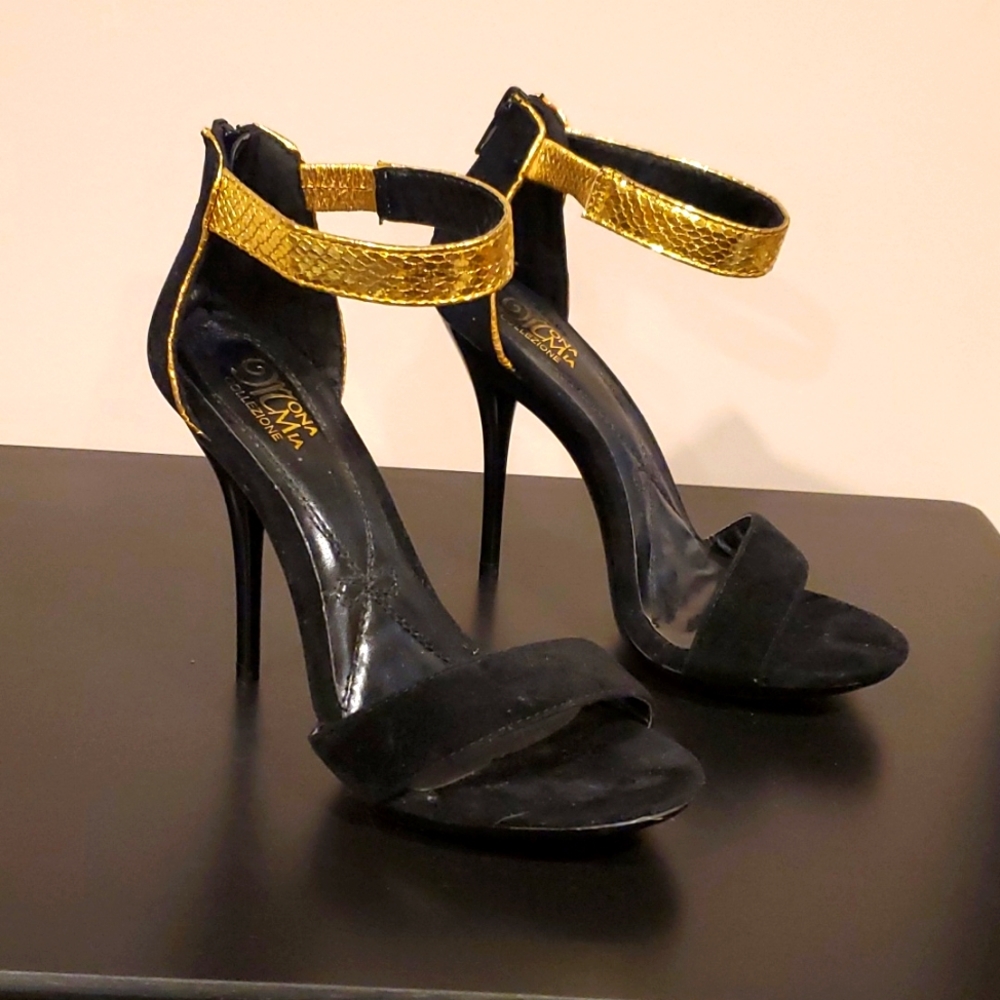 Elegant gold and black heels